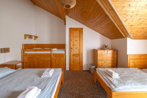 Ένα ή περισσότερα κρεβάτια σε δωμάτιο στο Tatralandia - Apartmán ANJA