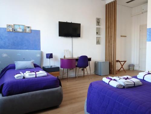 Una cama o camas en una habitación de Brà Guest House