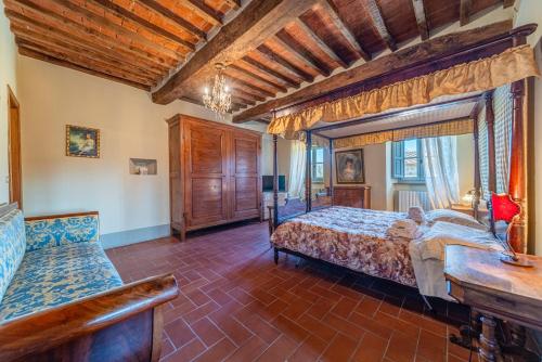 Ένα ή περισσότερα κρεβάτια σε δωμάτιο στο Santantimo Tuscany Inn