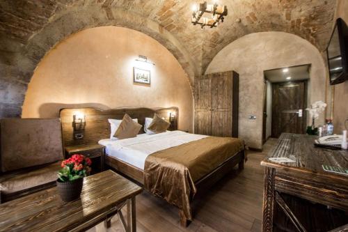 Postel nebo postele na pokoji v ubytování Art Passage Hotel