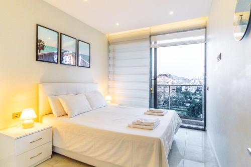 Postel nebo postele na pokoji v ubytování The Blue Tide - 1 Bedroom Apartment - All Bills Included