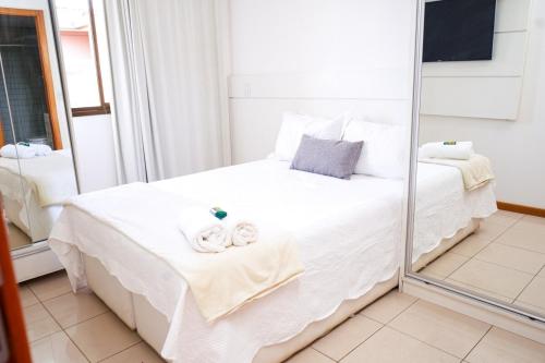 En eller flere senge i et værelse på Life Resort - Temporada