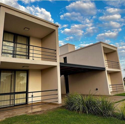 a large building with balconies on the side of it at Campo Galano in Miramar