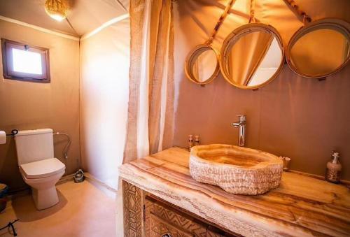 Ванная комната в Sandrock Luxury Camp