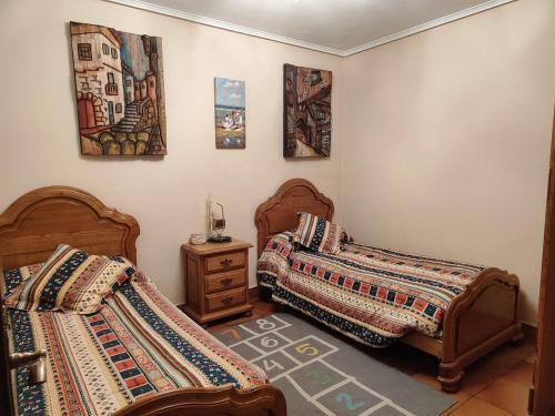 Ένα ή περισσότερα κρεβάτια σε δωμάτιο στο Caserío en Arrieta