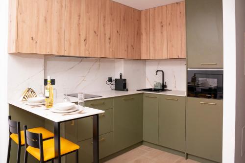 Kuchyň nebo kuchyňský kout v ubytování App Dichtbij vliegveld, Madrid centrum en IFEMA