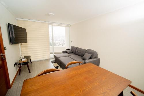 Et tv og/eller underholdning på Departamento Distrito 1 Cavancha Piso 19