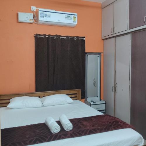 Giường trong phòng chung tại APMSV Home Stay