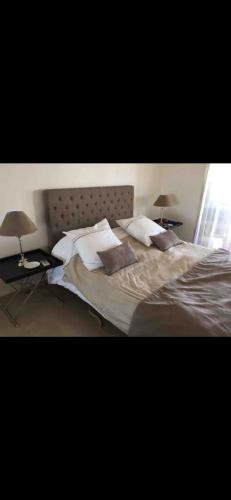 Кровать или кровати в номере appartement de prestige