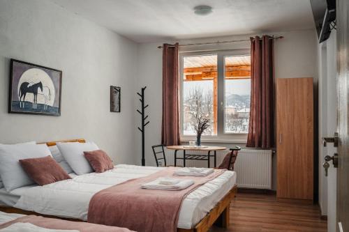 Ένα ή περισσότερα κρεβάτια σε δωμάτιο στο Guest house ''Viktoria''