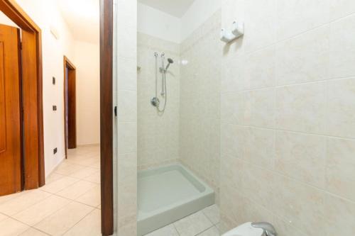 a bathroom with a shower and a bath tub at In pieno centro vicino al mare in Ischia Town