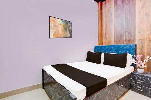 Ένα ή περισσότερα κρεβάτια σε δωμάτιο στο Hotel O Heritage