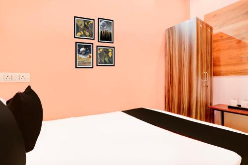 Ένα ή περισσότερα κρεβάτια σε δωμάτιο στο Hotel O Heritage