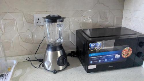 Принадлежности для чая и кофе в Sky Blue Apartment