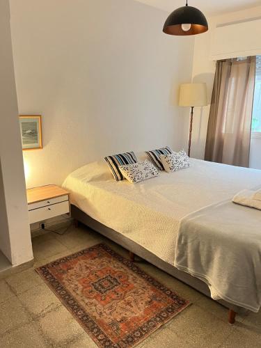 En eller flere senge i et værelse på Casa Raíz para 4 personas frente al río