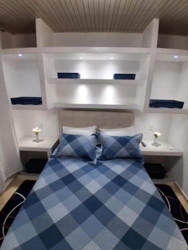 Una cama o camas en una habitación de Recanto do Sossego