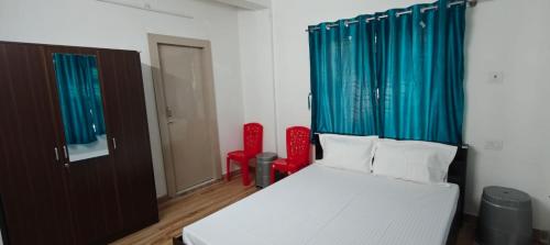 Ένα ή περισσότερα κρεβάτια σε δωμάτιο στο Party Place