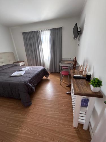 Ένα ή περισσότερα κρεβάτια σε δωμάτιο στο Alborada