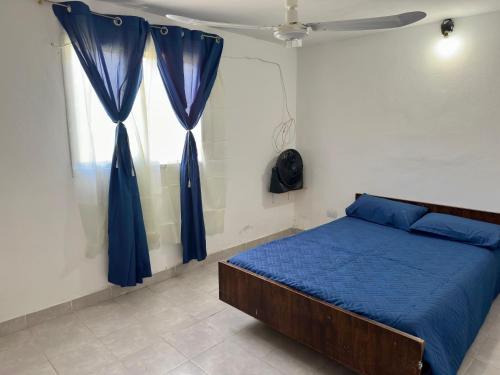 Ένα ή περισσότερα κρεβάτια σε δωμάτιο στο La Casa De Juan