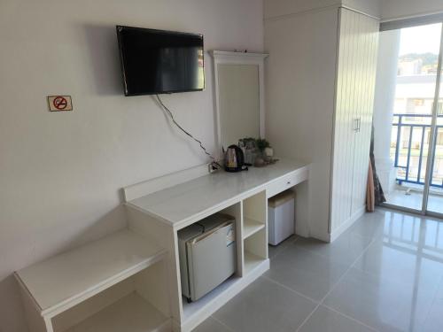 Kuchyň nebo kuchyňský kout v ubytování Santi White House Patong