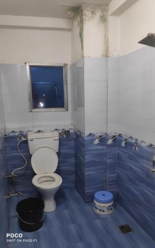 Phòng tắm tại Mahadev Guest House