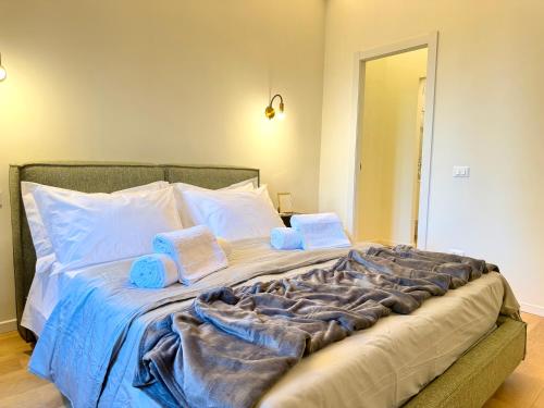 En eller flere senge i et værelse på Cortela Dimora Scaligera