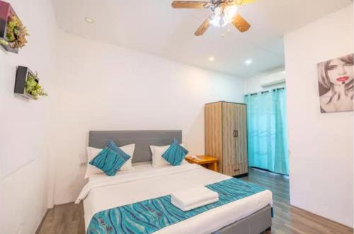 En eller flere senge i et værelse på NO 7 Garden Villa