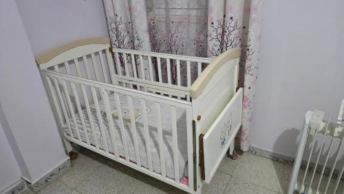 En eller flere senge i et værelse på An entire house in Béchar منزل كامل في بشار