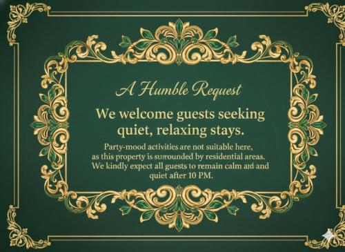 ムンナルにあるMunnar Valley Viewの金色の結婚式の招待状の枠