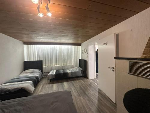 Ένα ή περισσότερα κρεβάτια σε δωμάτιο στο Holiday Oasis 2 near Legoland Deutschland