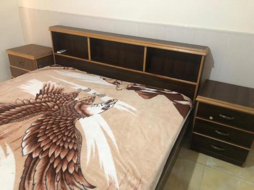 Ένα ή περισσότερα κρεβάτια σε δωμάτιο στο Irbid