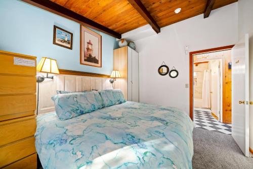 Ένα ή περισσότερα κρεβάτια σε δωμάτιο στο Ocean's Doorstep MCA#1121