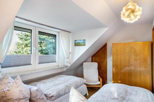 Кровать или кровати в номере Ferienwohnung S Viering