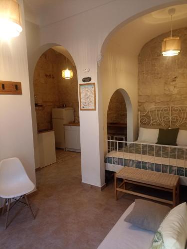 Postel nebo postele na pokoji v ubytování Tirella Home