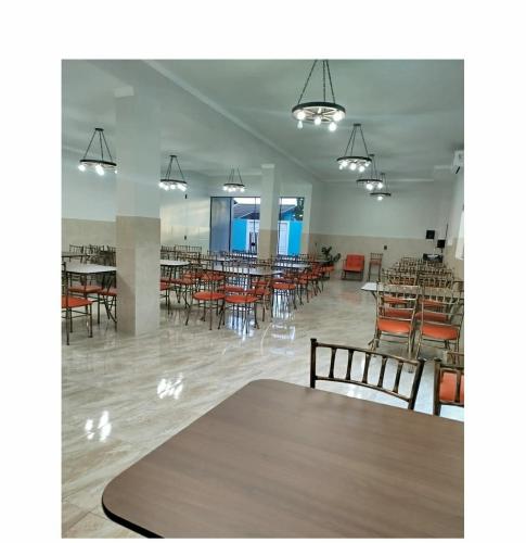 En restaurant eller et andet spisested på Raízes Hotel