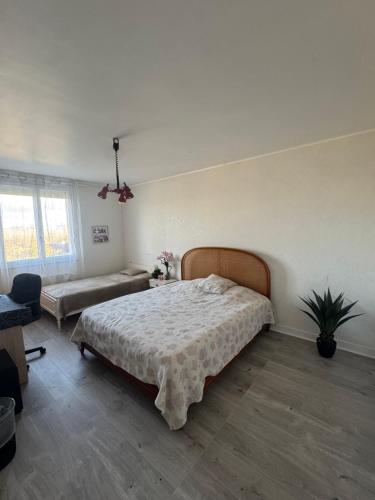 Ένα ή περισσότερα κρεβάτια σε δωμάτιο στο Madlen