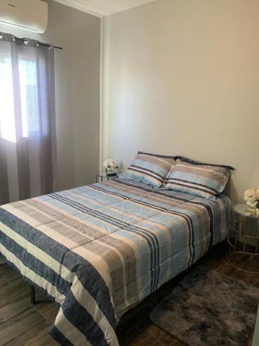 Postel nebo postele na pokoji v ubytování Departamentos Yireh