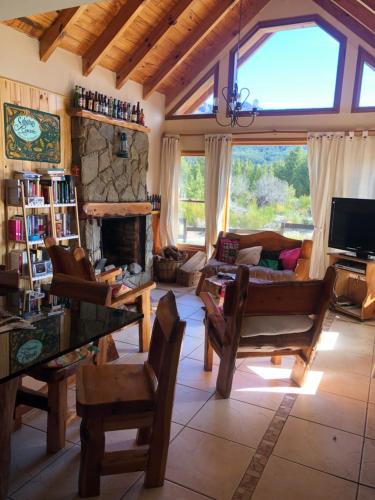 Телевизор и/или развлекательный центр в Cabañas Rincón