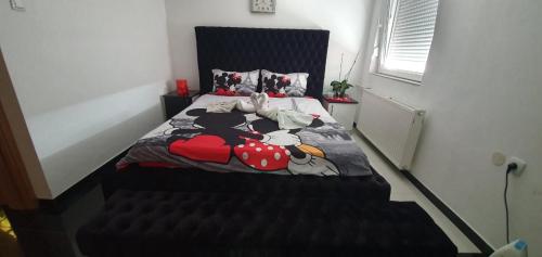 Giường trong phòng chung tại Princeza apartman