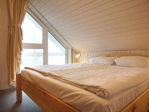 Postel nebo postele na pokoji v ubytování skandinavisches Ferienhaus in Mirow