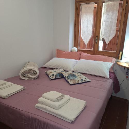 Ένα ή περισσότερα κρεβάτια σε δωμάτιο στο Il Rifugio di Greta