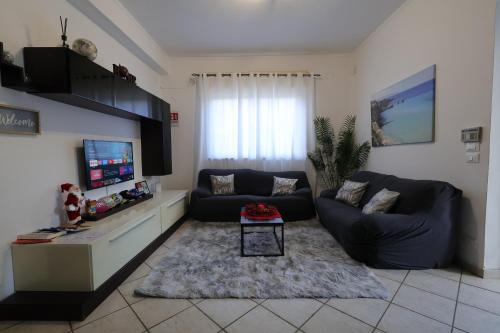 Et opholdsområde på Casa vacanze Ciachea Home - con BBQ , Parcheggio gratuito , A 10 min Da Palermo & Aeroporto