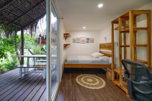 Ένα ή περισσότερα κρεβάτια σε δωμάτιο στο Panama Kite Center