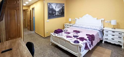 Ένα ή περισσότερα κρεβάτια σε δωμάτιο στο Magnifico