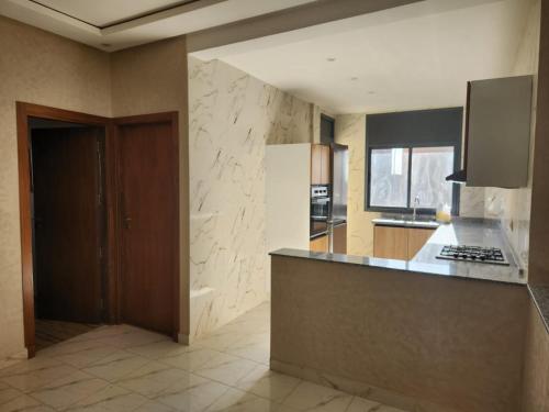 Η κουζίνα ή μικρή κουζίνα στο Appartement Aéroport Holiday