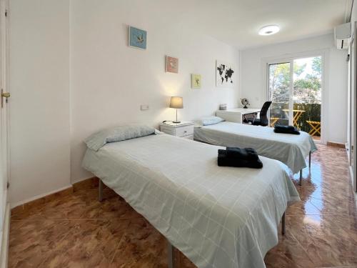 Postel nebo postele na pokoji v ubytování Almirall Playa