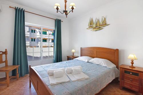 Ένα ή περισσότερα κρεβάτια σε δωμάτιο στο Moradia 41