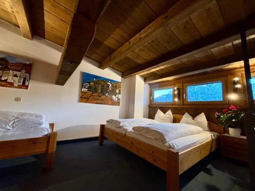 Postel nebo postele na pokoji v ubytování Ferienhaus Alpina Ötztal