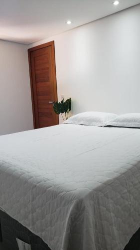 En eller flere senge i et værelse på Casa Sea Fox