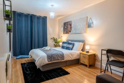 En eller flere senge i et værelse på Nexus - 24hr Self Check-In, Free Parking